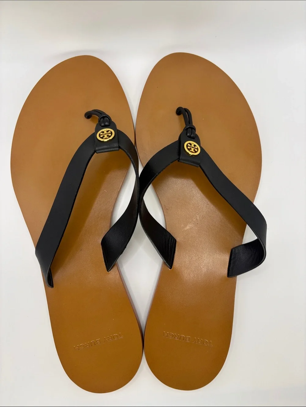 Tory Burch Black and Tan Leather Flip Flop Sandals
